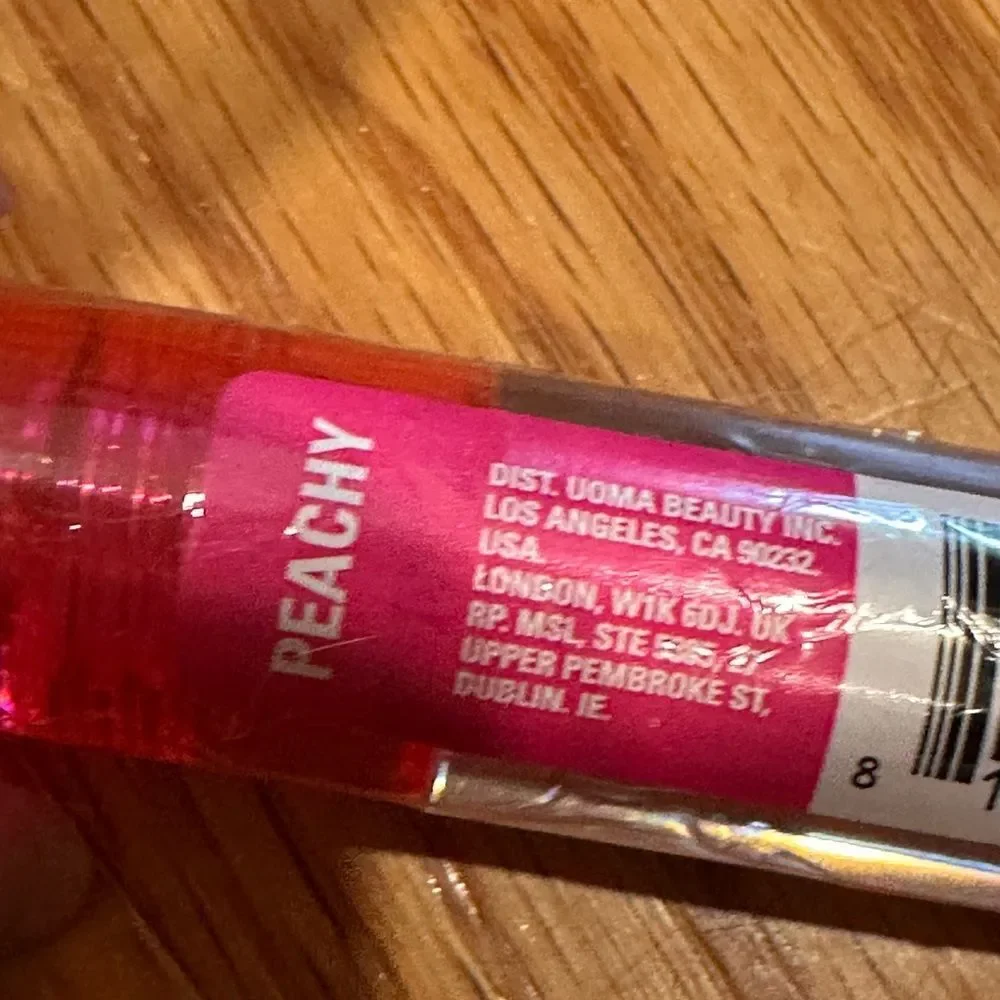 Sharon C Uoma Beauty peachy nude lipgloss
